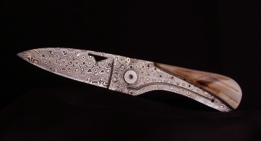U Cumpà folding knife in Warthog Ivory and Damascus blade