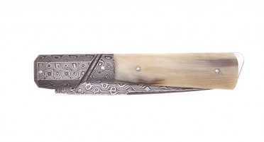 Handmade folding knife, with ram horn handle, bolster and damascus blade
