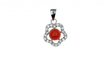 Rhinestone and red coral flower mounted as a pendant